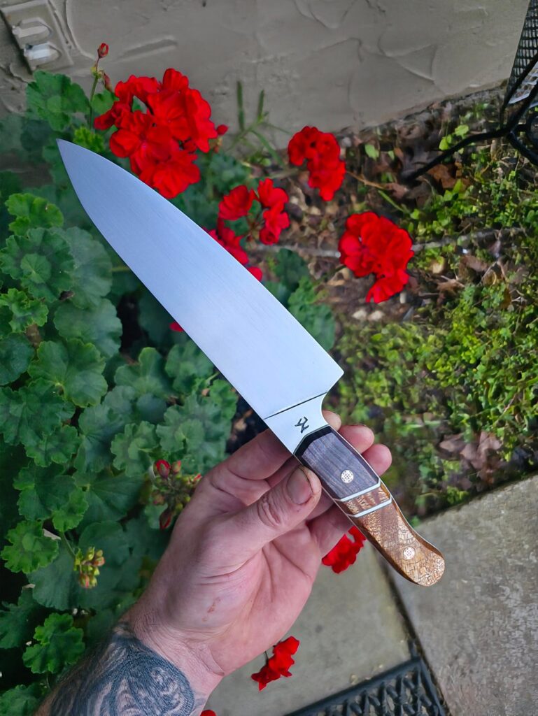 Couple finished up today, 7 inch AEB-L Chef knives with some segmented handles I made👍