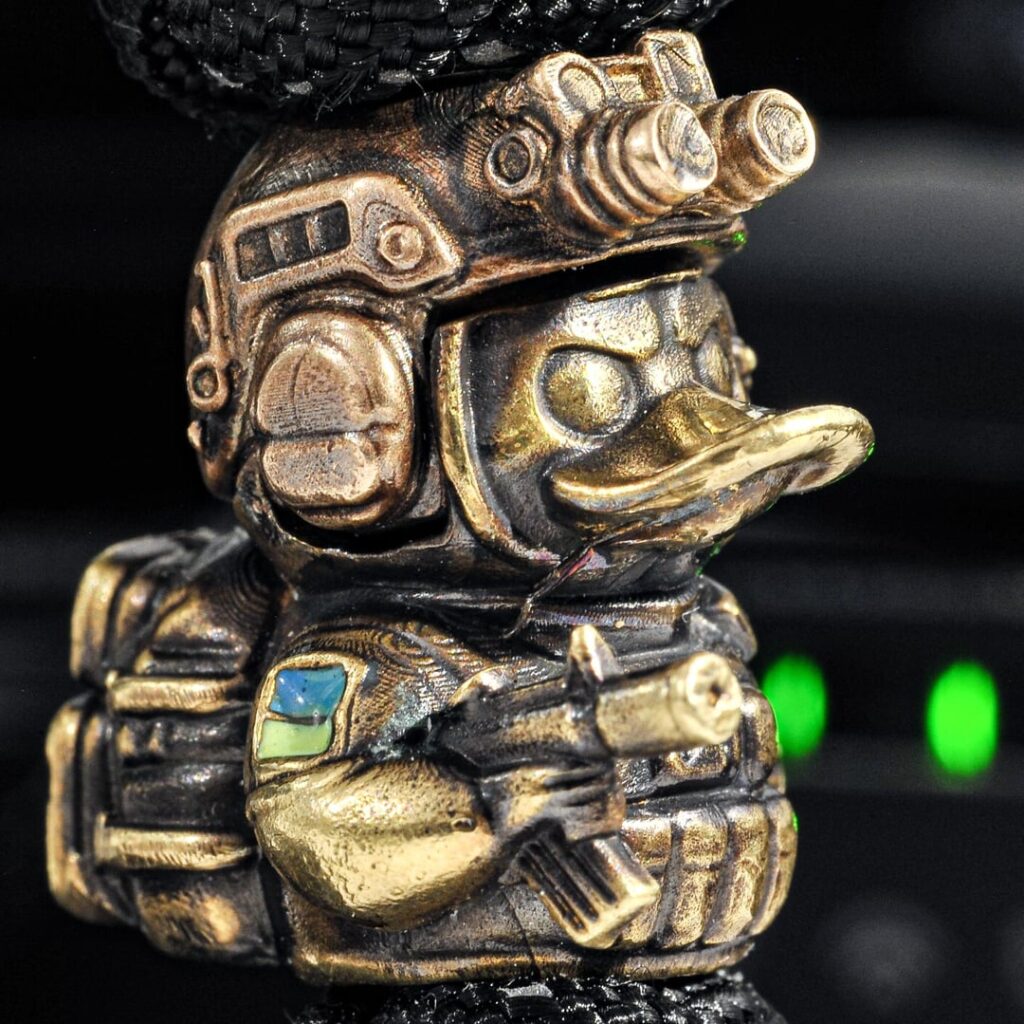 Duck paracord lanyard bead (brass duck, bronze helmet)