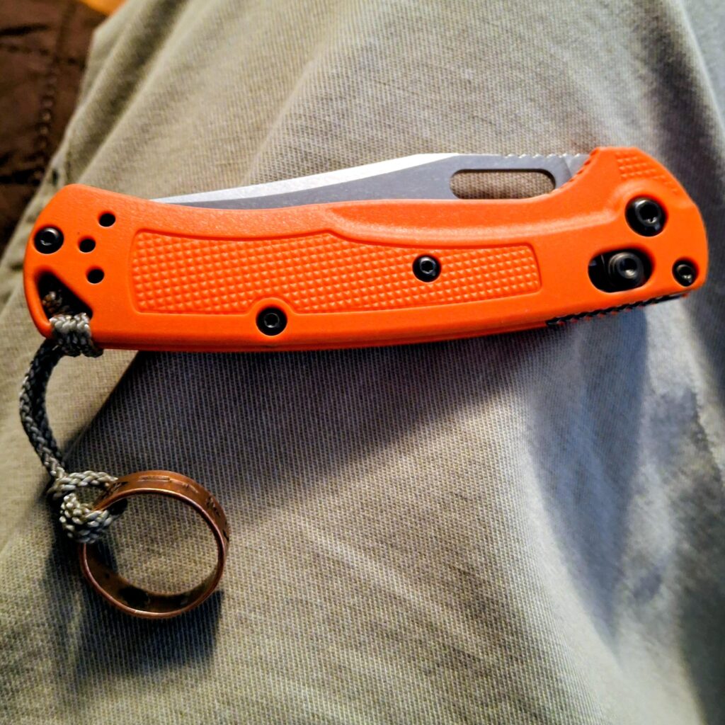 The Usurper. Instantly my new number one EDC right out of the box, less than 2 oz. Benchmade mini tagged out