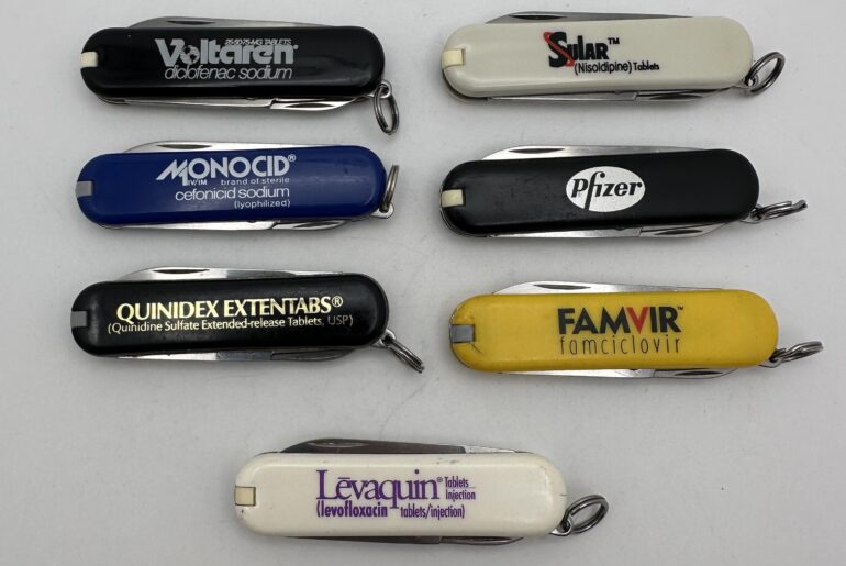 My accumulation of pharmaceutical marketing Swiss Army knives. Imagine if these companies just made drugs cheaper instead of buying custom knives