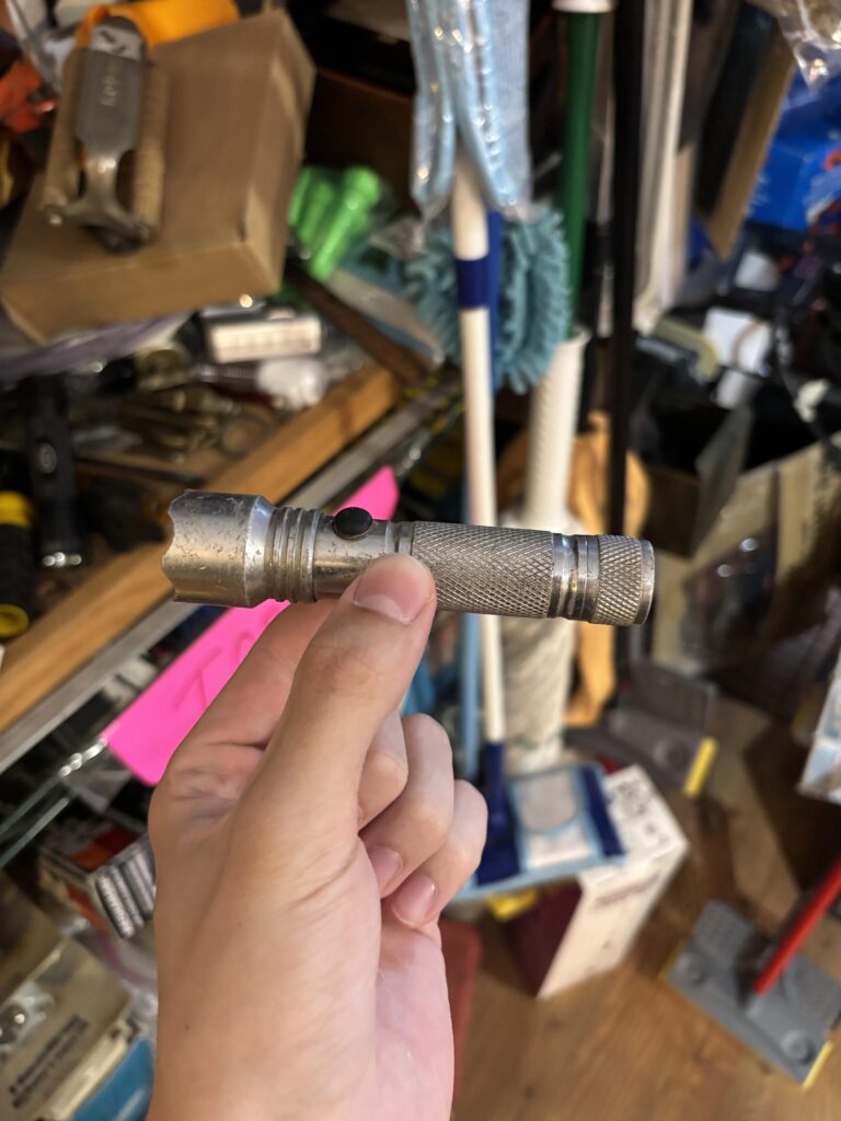 Can anyone help me identify this flashlight I just picked up from a thrift store?