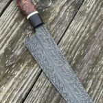 Here's a new knife, our feather Damascus with Honduran Rosewood Burl. She's a beut right?