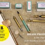 Looking for a small canister keychain that fits 1 standard international fountain pen ink cartridge. Any suggestions?