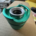 Removing outer metal button ring?