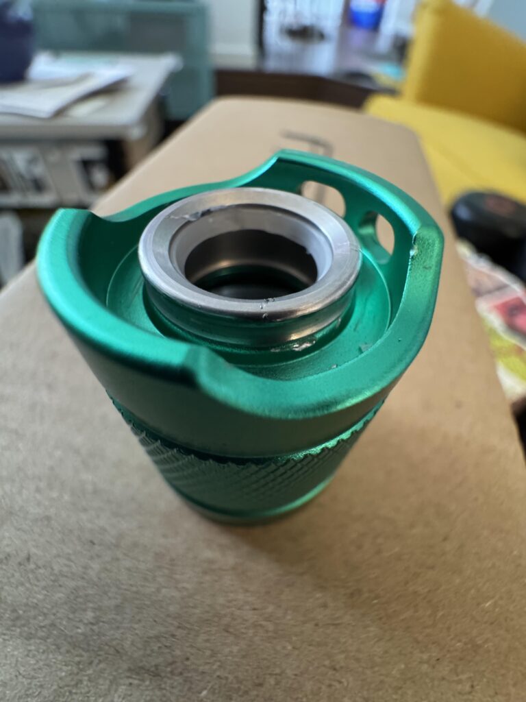 Removing outer metal button ring?