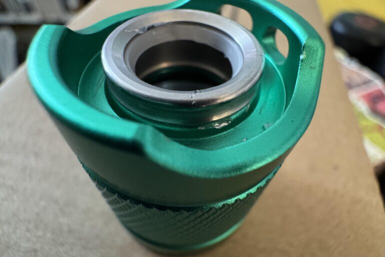 Removing outer metal button ring?