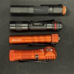 What flashlights do yall carry every day? I alternate between these.