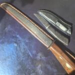 Hand forged damascus knives by my late father.