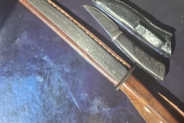 Hand forged damascus knives by my late father.