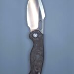 Gringo. Verta Lock. Satin blade. Carbon fiber. If anyone is thinking of getting a Kunwu, I've just received my perfect one. I've tried out 4 other similar Kunwu's and learned exactly what I want and don't want from them.