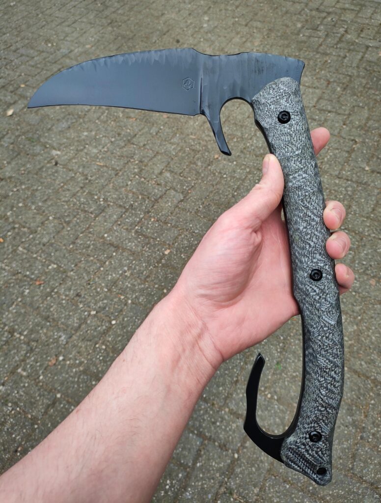 Between knives and axes making I've just finished custom fulltang tool, inspired by kama. Not sure if I can still name it kama, becouse of a lot of mods. One piece of steel, fulltang, Silver twill handle and cerakote coating - Vultur Custom Knives