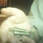 Icetek stainless miniature working balisong. Makes a neat pendant to show off my love of butterfly knives!