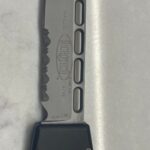 How can I clean this knife so it opens smoother?