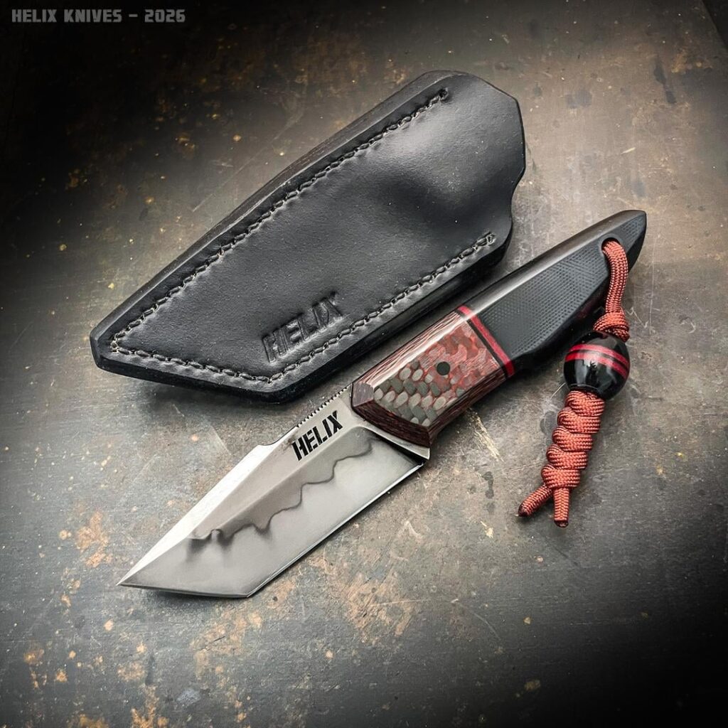 Pocket carry tanto. 26C3 steel with a hamon, black/red carbon fiber, G10, clip on pocket sheath and matching bead.
