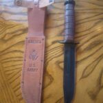 A friend of mine had an old "kbar" that he had inherited from his uncle who carried it in Viet Nam. Somehow between here and there all the guard was replaced, the old stacked leather handle likely dry rotted off and was replaced with cord and wire, and the blade was extremely rusted and stained. I l