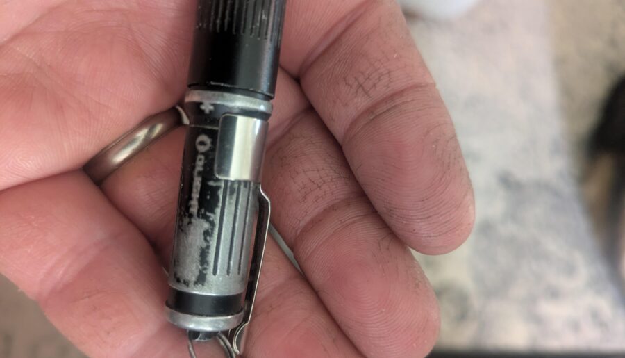 Pocket clip on the olight i3eos