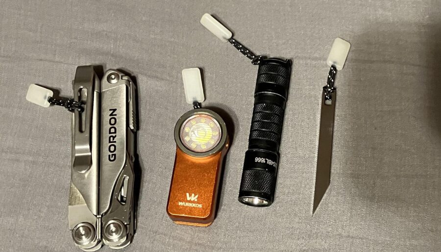 I got glow in the dark zipper pulls for everything because I walk at night often