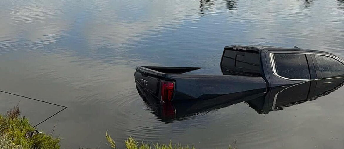 Truck plunges into Huntington Beach wetlands off Pacific Coast Highway