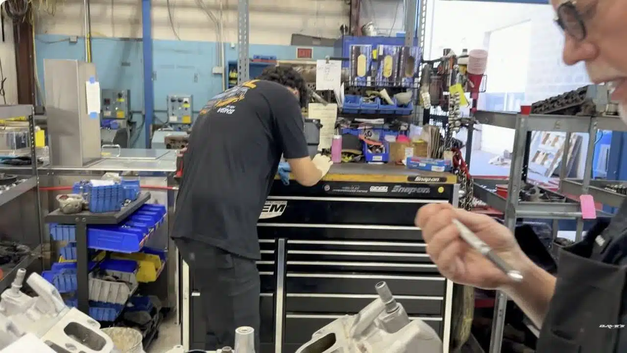 Dave discussing his GM 6.2L engine theory at a workshop bench